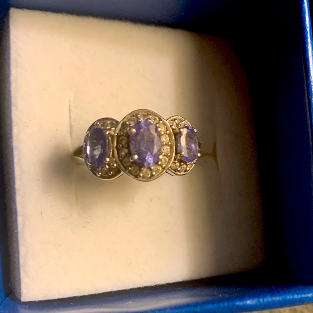 Trilogy genuine oval cut tanzanite ring 1 ctw